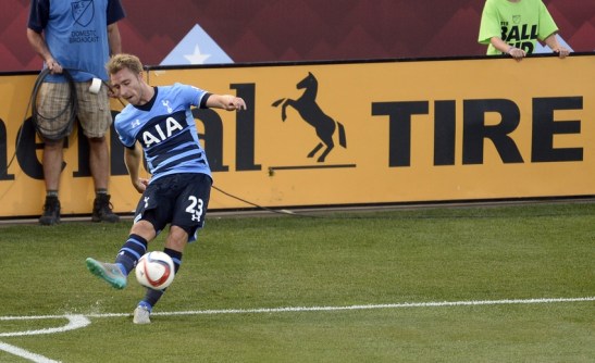 Jul 29, 2015; Denver, CO, USA; Tottenham Hotspur midfielder Christian Eriksen (23) makes a corner kick during the first half of the 2015 MLS All Star Game against the MLS All Stars at Dick's Sporting Goods Park. Mandatory Credit: Ron Chenoy-USA TODAY Sports